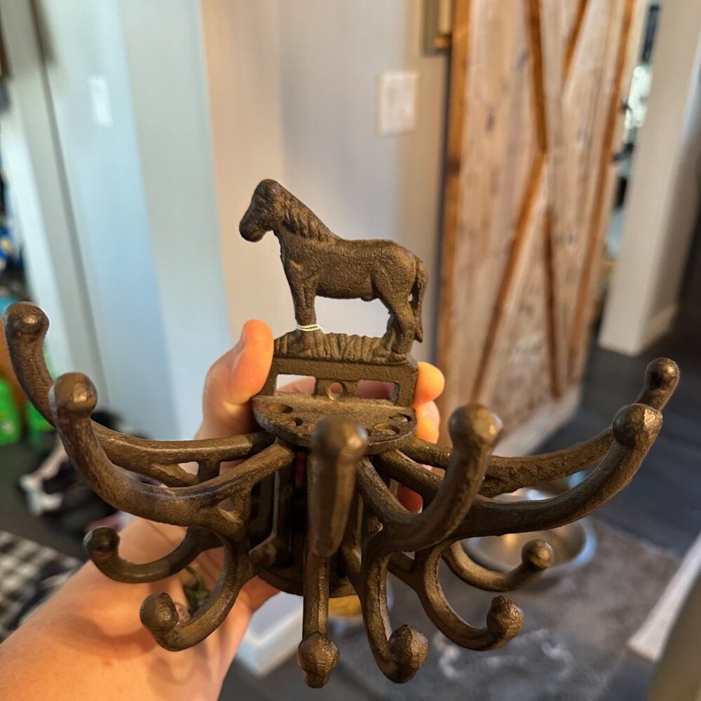 Cast iron wall mounted swivel coat rack